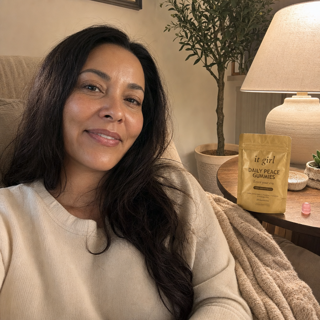 Mom about forty on the couch in the evening, calm and present with her kids' things nearby, the Daily Peace pouch on the side table, no wine, it was never willpower