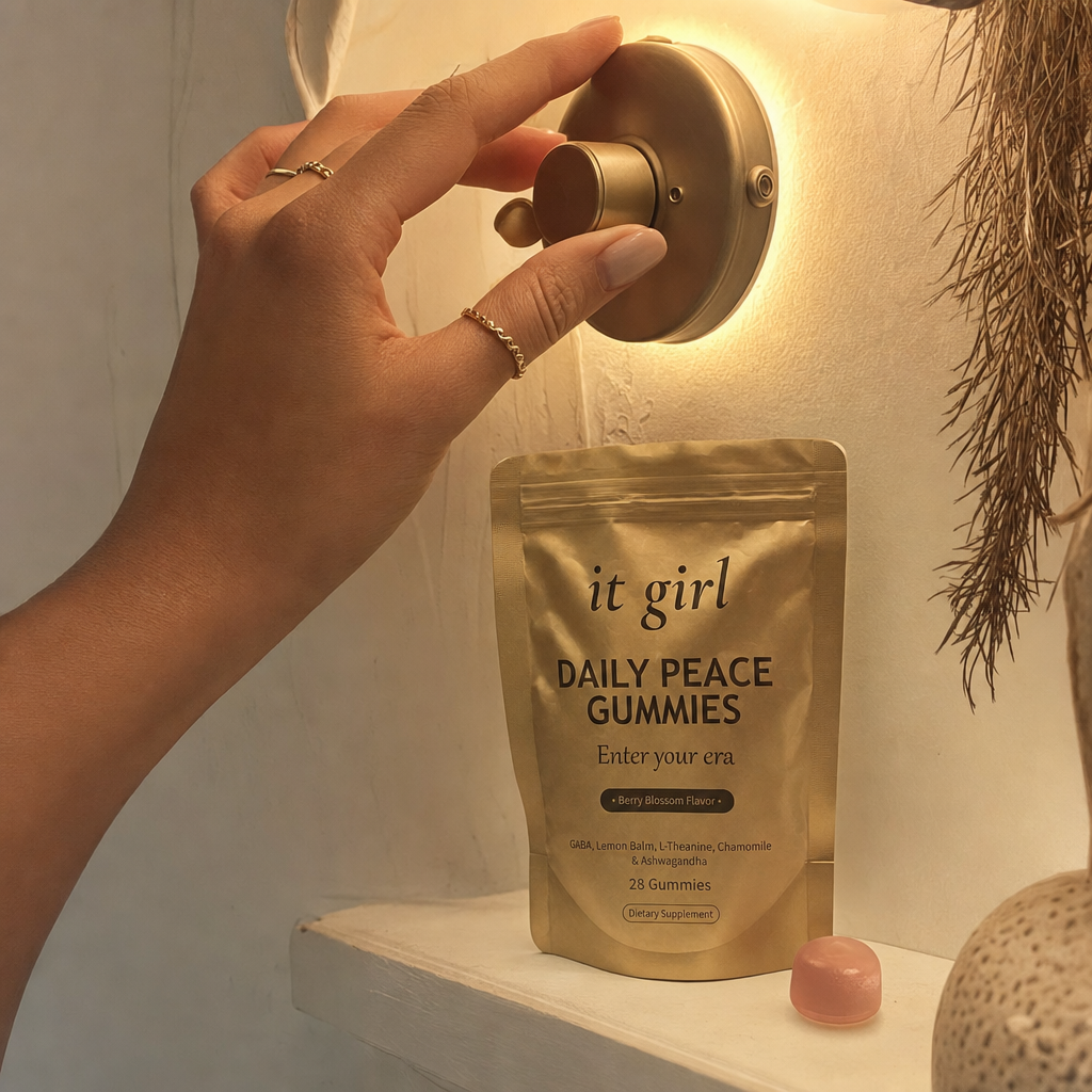 A hand gently turning a warm brass dimmer dial so a soft golden light grows brighter, the calm signal coming back online