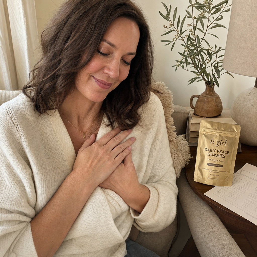 Lauren Hartley in soft evening light with both hands resting easy, a printed lab note and the gold Daily Peace pouch on the counter, the moment the self-blame lifts