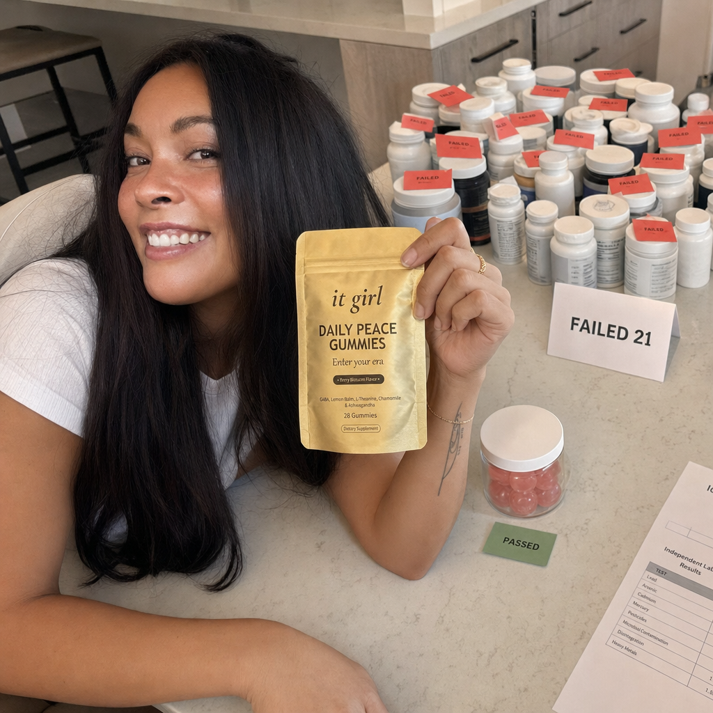 Lab counter showing 21 anonymized supplement bottles tagged failed pushed aside, with two passing products forward and the gold It Girl Daily Peace pouch lifted highest as the one built for women