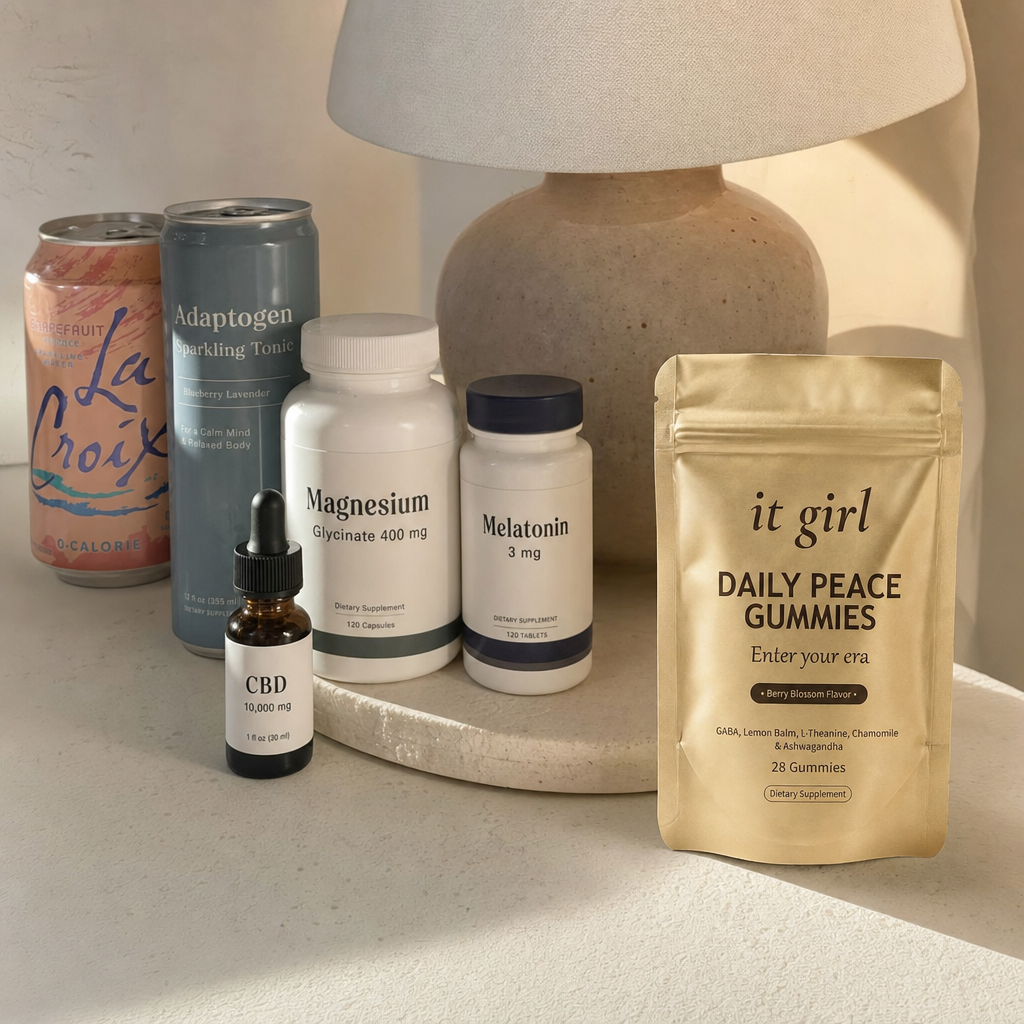 A warm still-life comparison, the abandoned wine swaps and calm-aisle bottles of magnesium melatonin and CBD grouped and faded on the left, the real gold Daily Peace pouch in warm focus on the right as the one that reaches both layers