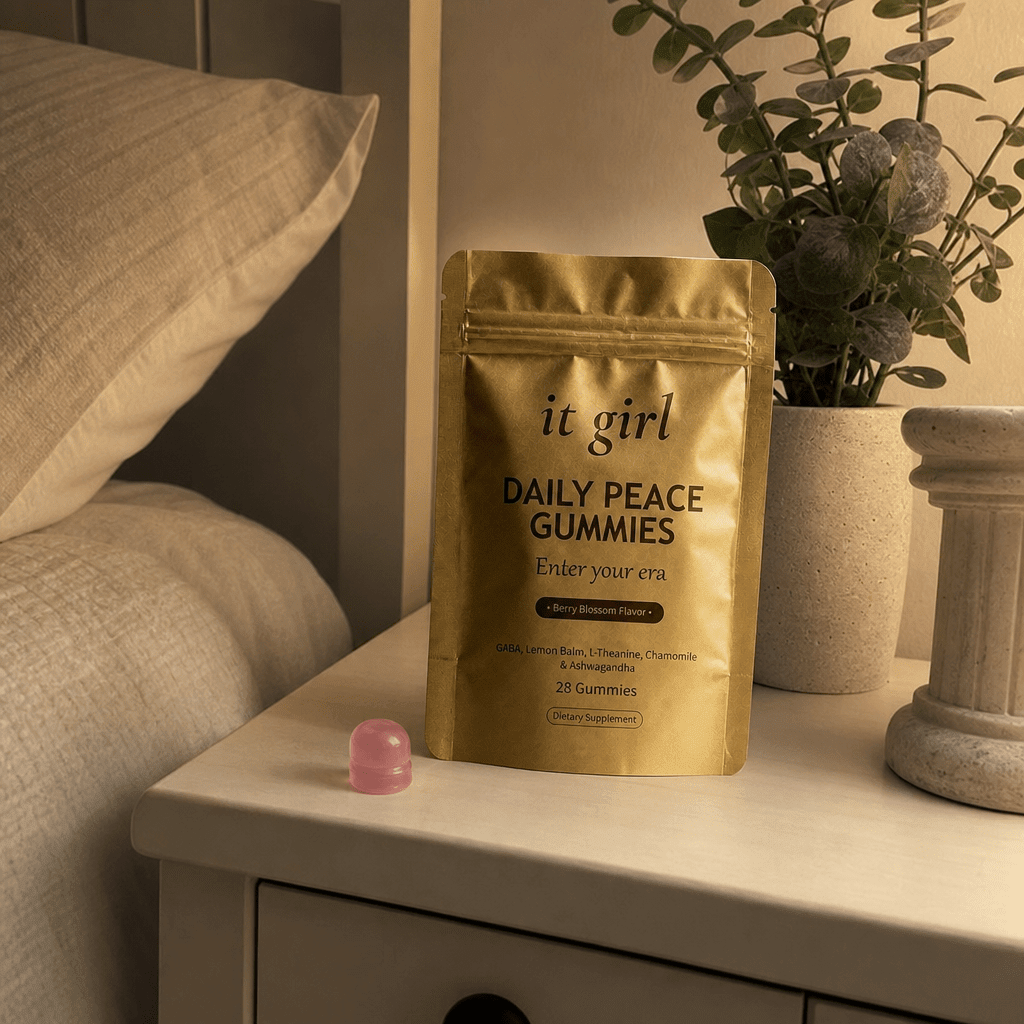 Daily Peace pouch on a cream nightstand with one gummy, a 28-day evening ritual