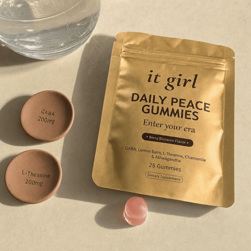 Flat-lay of a single Daily Peace gummy beside the pouch, a glass of water, and GABA 200mg and L-Theanine 200mg dose chips