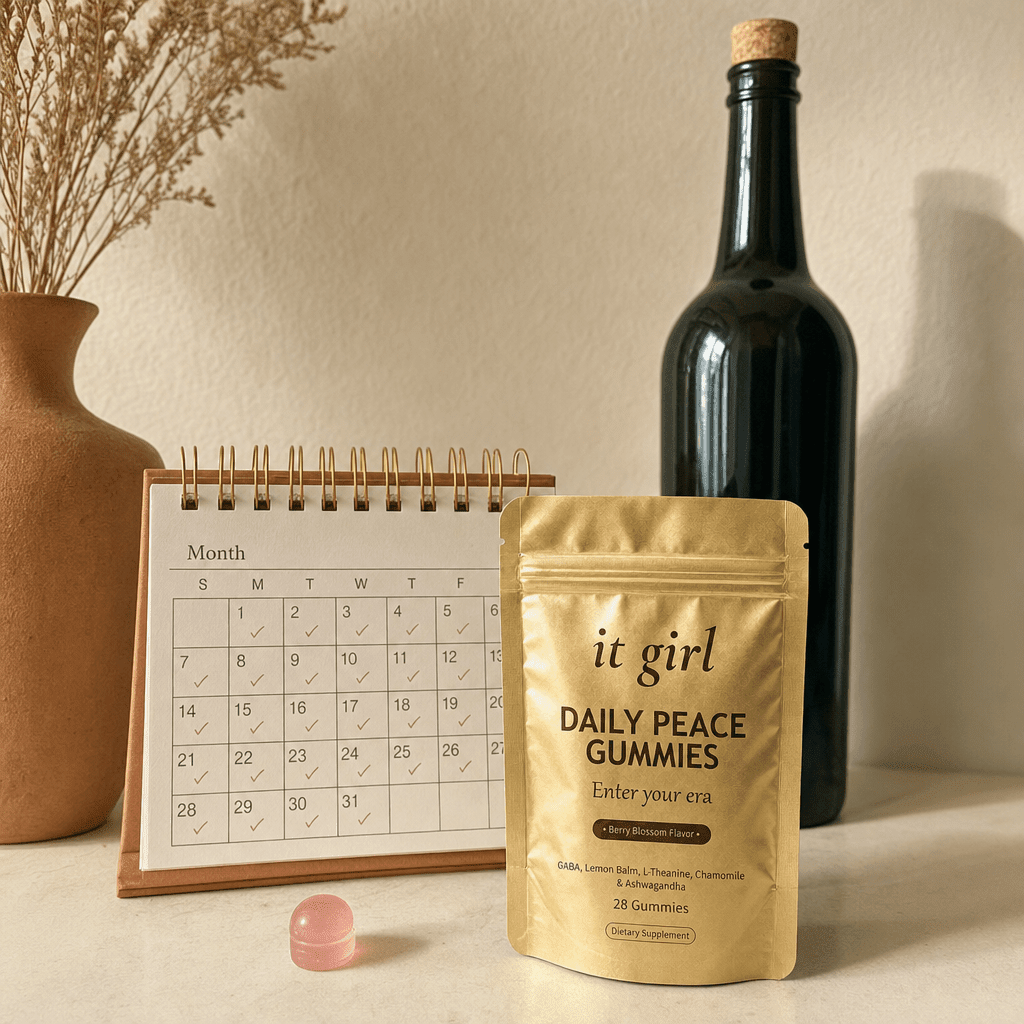 The palm-sized It Girl Daily Peace pouch beside a month calendar and one plain unbranded bottle of wine, a whole month of calm shown to cost less than a single bottle