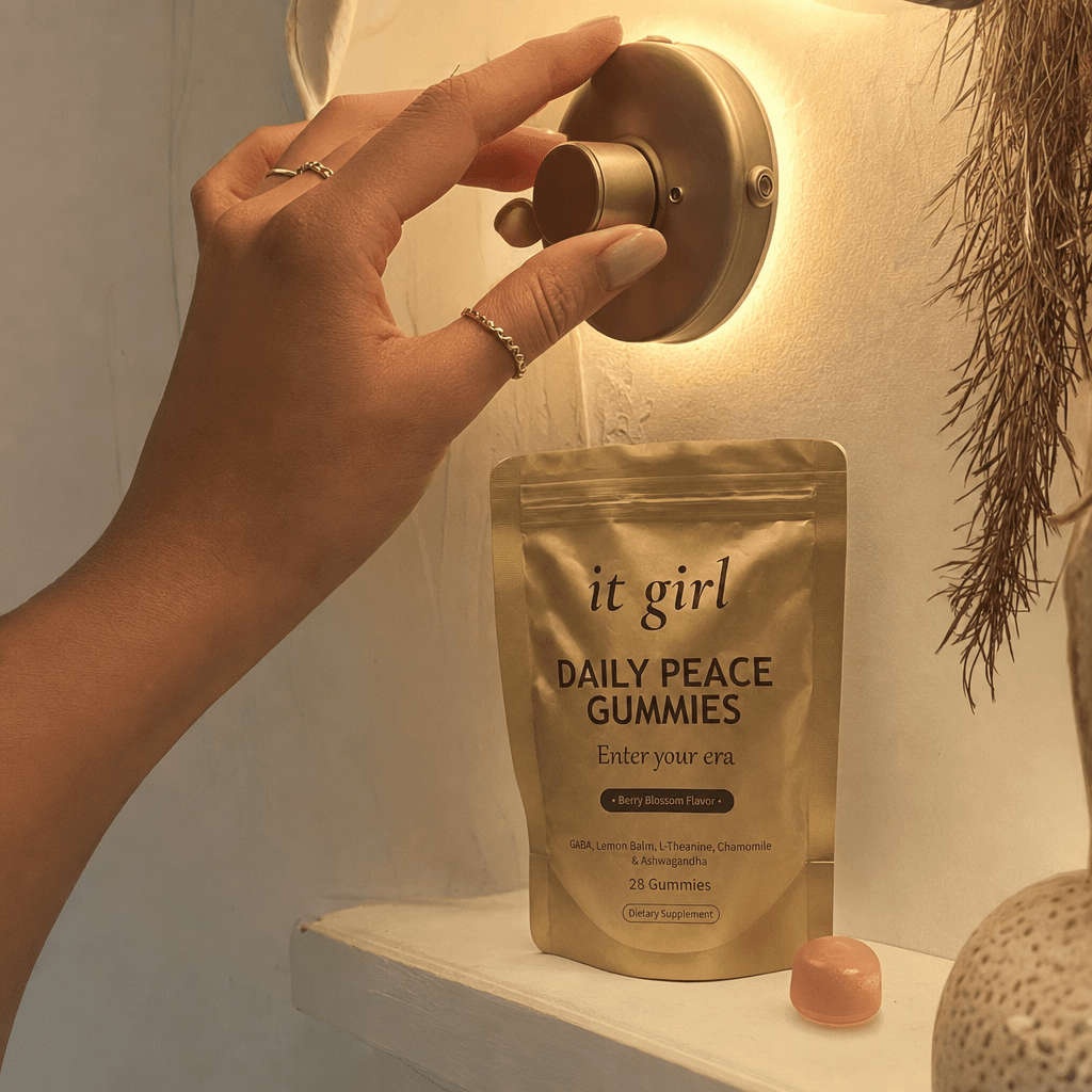 A hand gently turning a warm brass dimmer dial so a soft golden light grows brighter, the calm signal coming back online