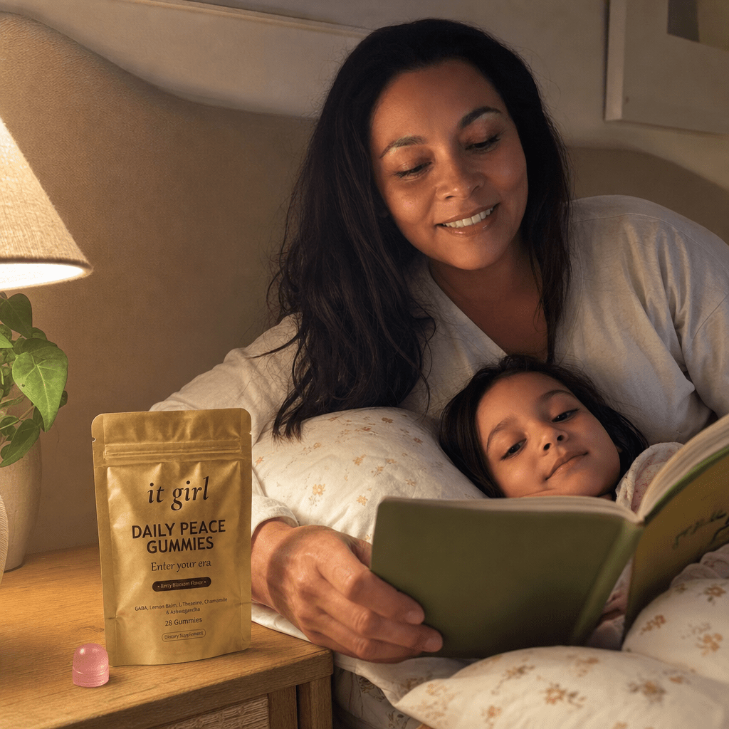 Mother in her late forties fully present at her child's bedside reading a bedtime story, calm and unhurried with no part of her already at the door, a gold Daily Peace pouch resting on the nightstand, soft warm lamplight