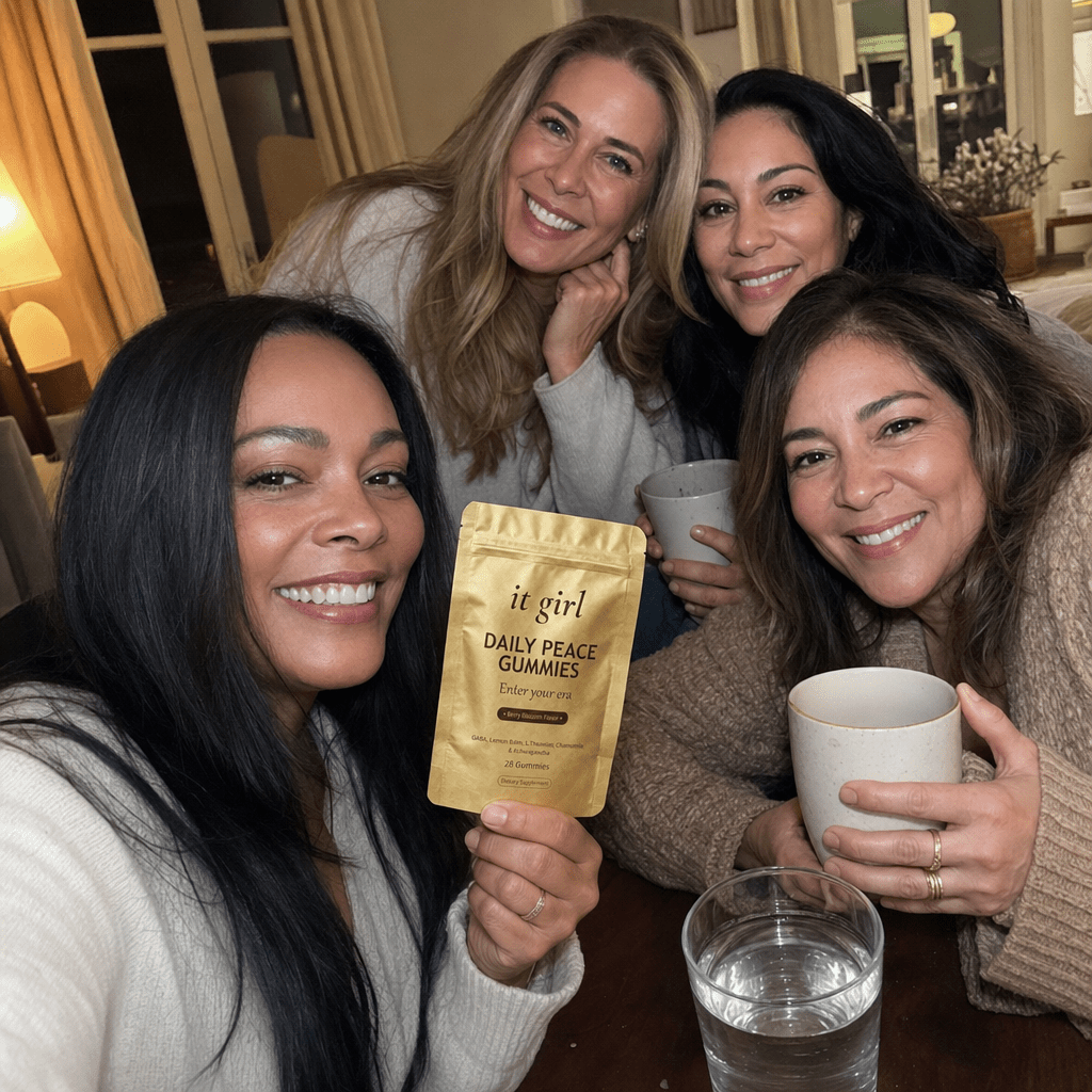 Warm candid group of women in their forties and fifties laughing together in a sunlit room, the gold Daily Peace pouch held in frame, third-party tested and made for women