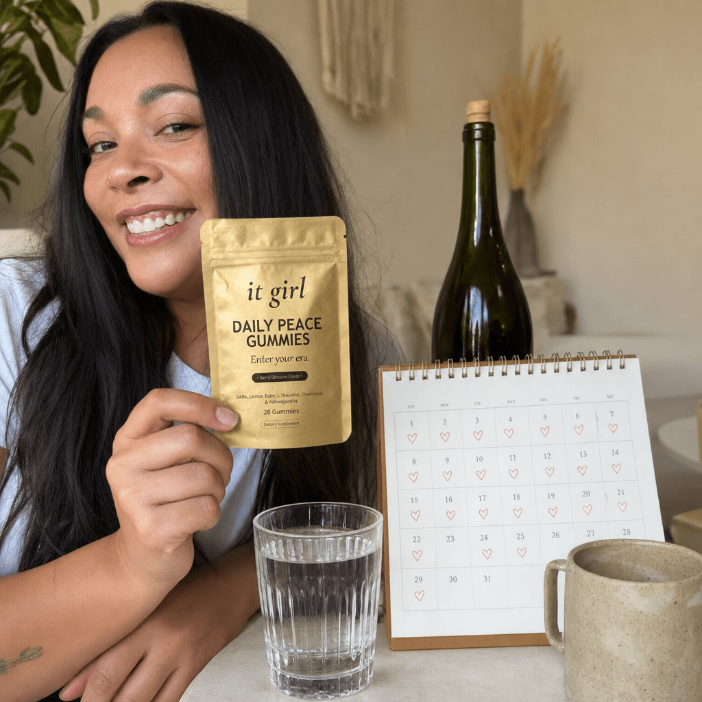The palm-sized gold Daily Peace pouch beside a month calendar and a single corked bottle of wine, a whole month of calm for less than that one bottle