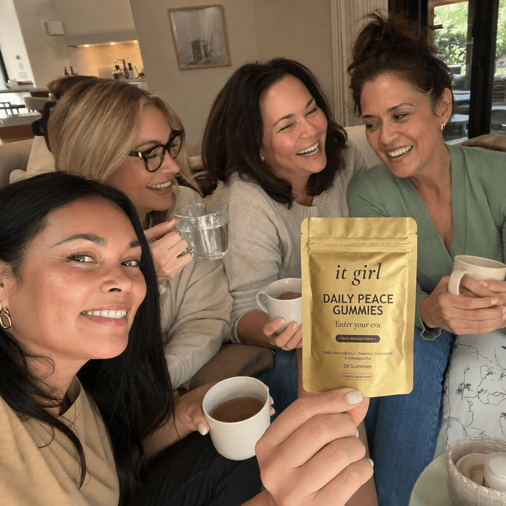 Warm candid group of women in their forties and fifties laughing together in a sunlit room, the gold Daily Peace pouch held in frame, third-party tested and made for women