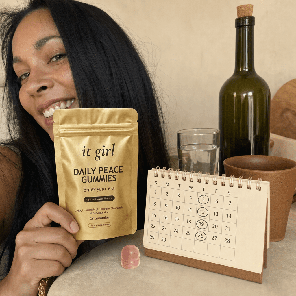 The palm-sized gold Daily Peace pouch beside a month calendar and a single corked bottle of wine, a whole month of calm for less than that one bottle